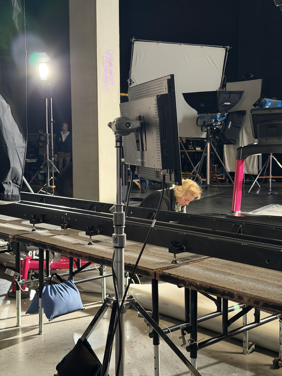 Teleprompter and light on stands on a stage set